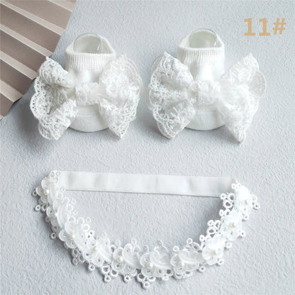 Newborn girl's gift: elegant lace bow headband paired with soft pink infant socks