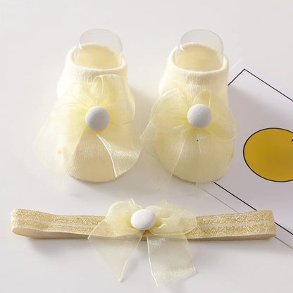 Sweet pink lace headband designed for newborn baby girls, offering a princess look