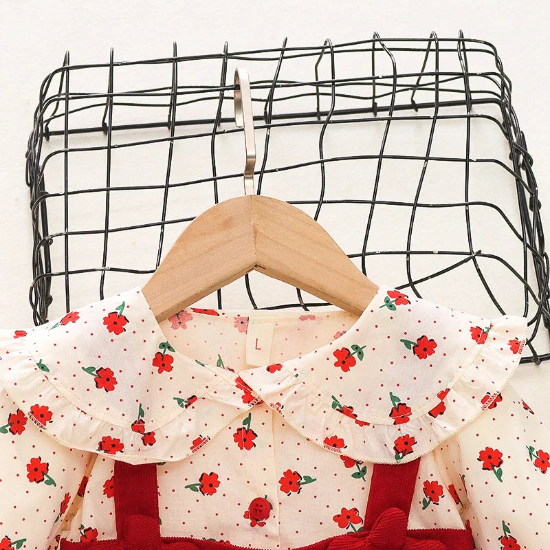Textured image of the cotton blend fabric of a girls' autumn floral dress, soft for toddler's skin.