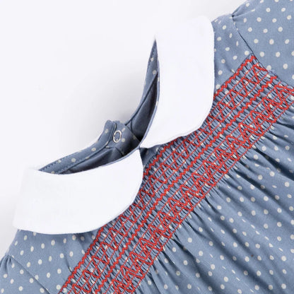 Toddler girl wearing a comfortable, light blue cotton summer dress with a cute rabbit design.