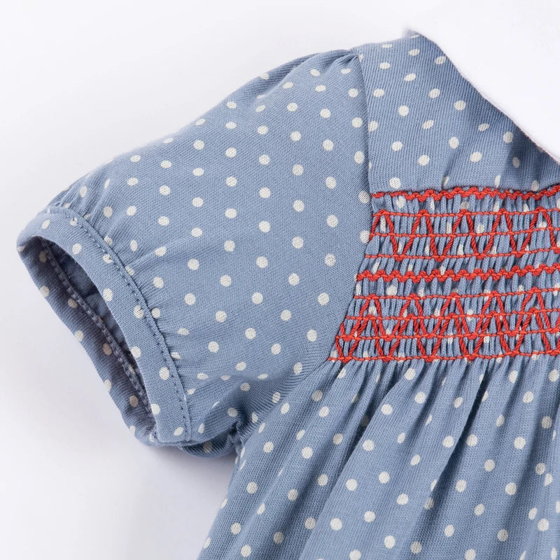 Full shot of a baby girls' casual cotton dress in soft yellow with an adorable rabbit applique.