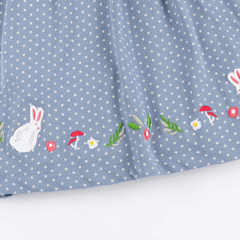 Embroidered rabbit detail on a sweet baby girls' cotton play dress, perfect for warm weather.