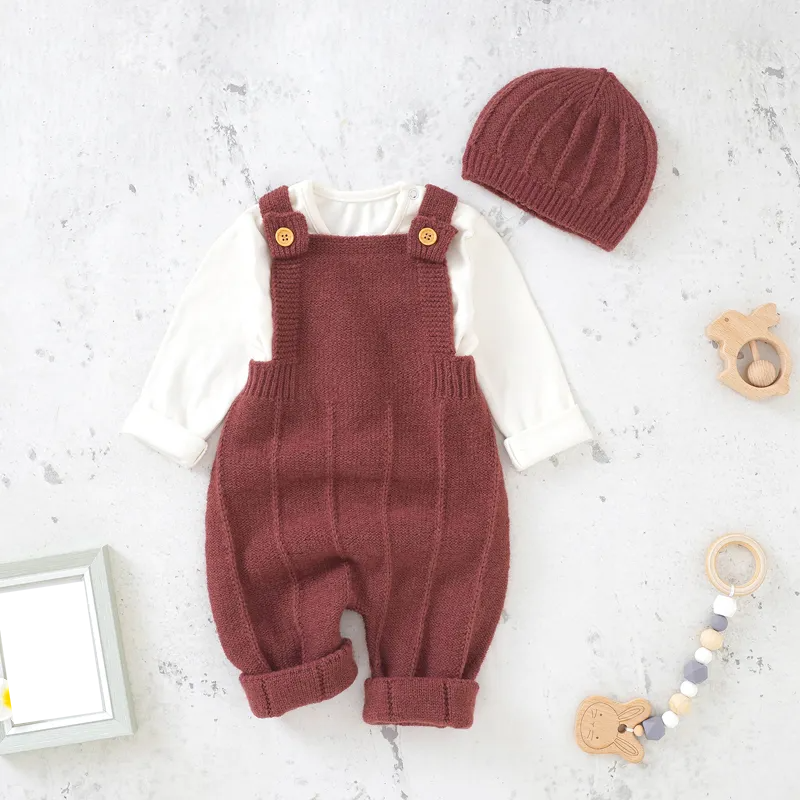Cream knitted sleeveless romper and hat set for baby girl, a charming newborn fashion choice