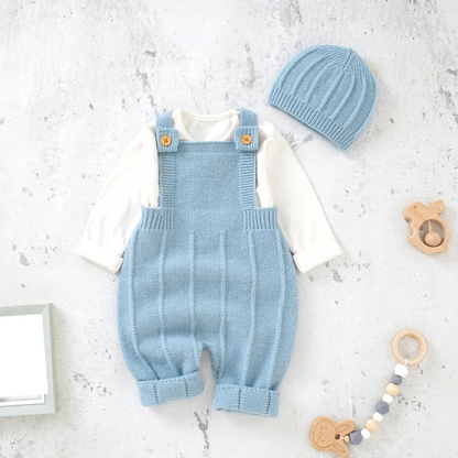 Baby girl fashion: sleeveless knitted romper with matching hat in a lovely soft pink hue