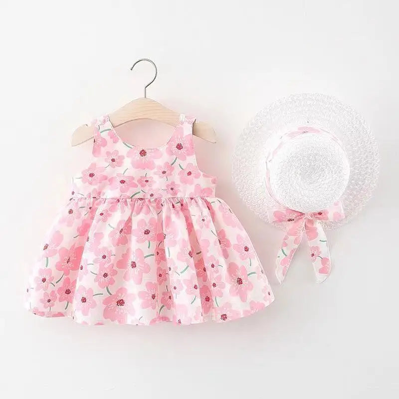 Side view of a baby girl's floral summer dress, highlighting its A-line silhouette and bow.