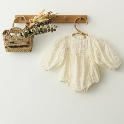Elegant long sleeve lace romper for baby girls, featuring a comfortable design and premium cotton.