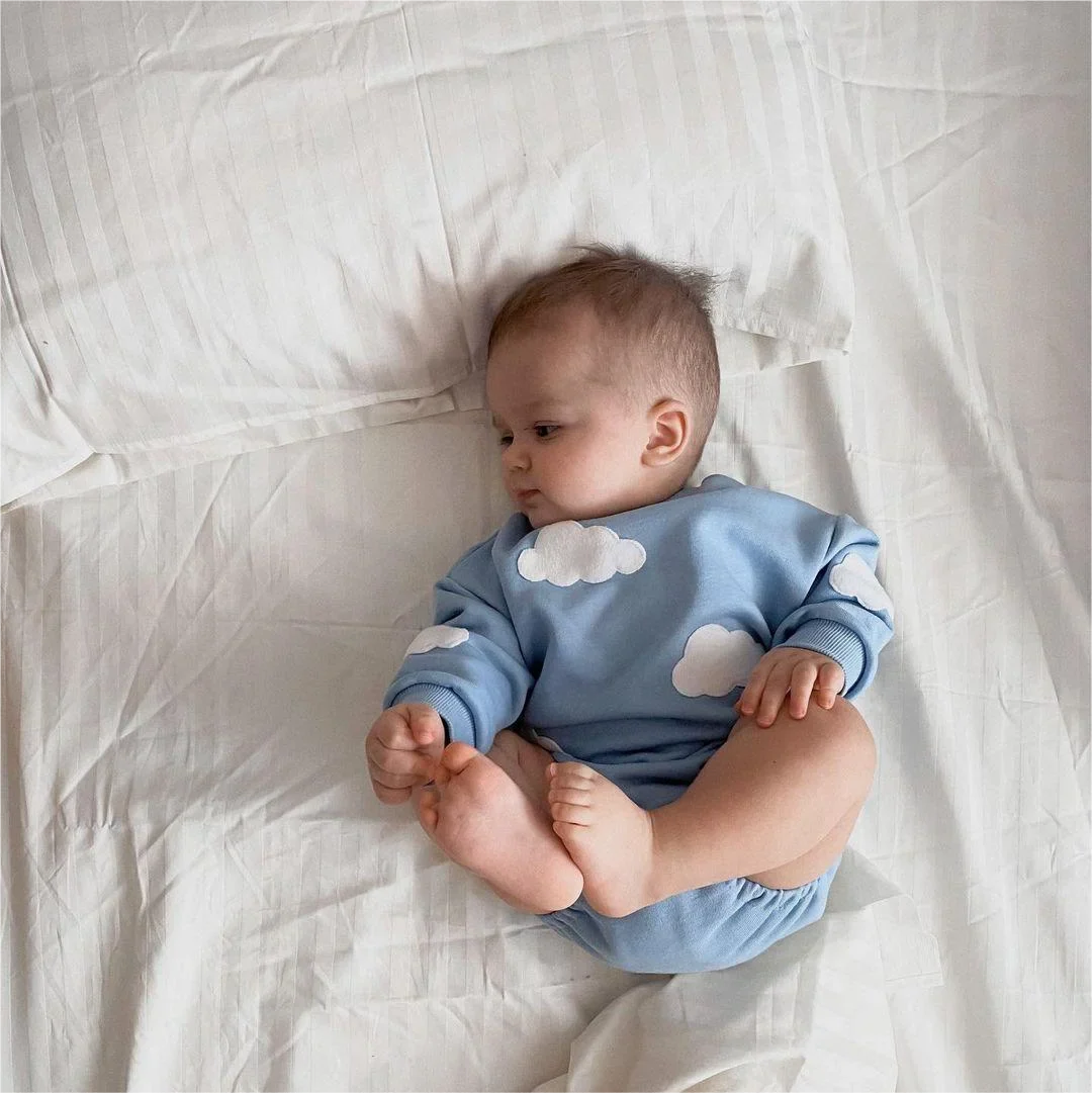 Cotton floral baby romper for spring, comfortable and stylish for newborns, infants, and toddlers