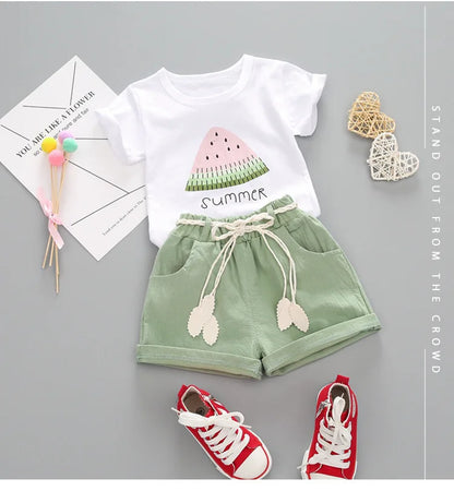 Toddler girl's stylish two-piece summer outfit with cute cartoon design on cotton fabric