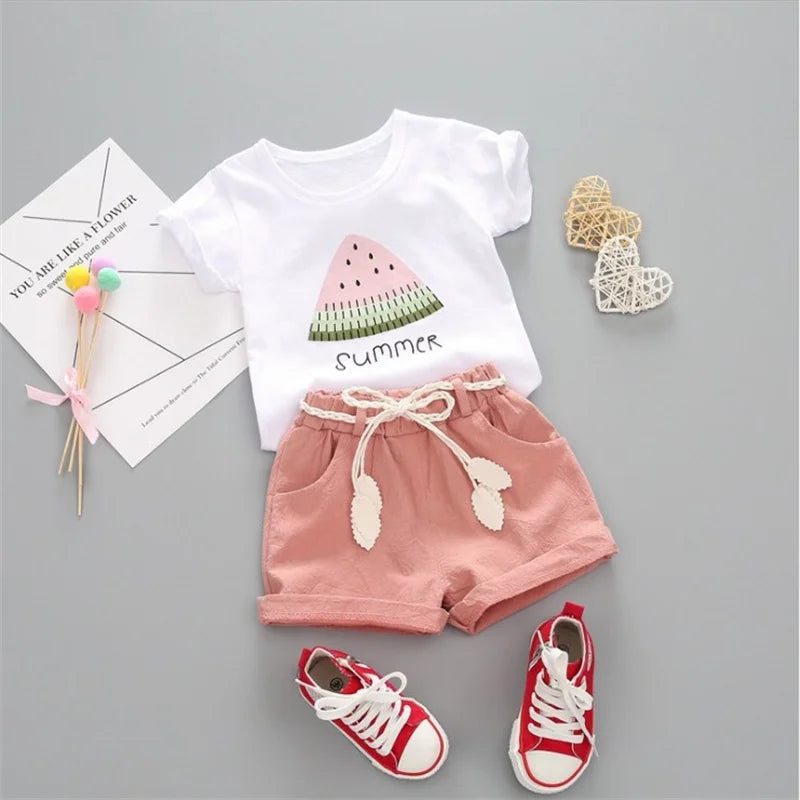 Adorable girls' two-piece summer set: short-sleeve top and comfy pants with cartoon graphic
