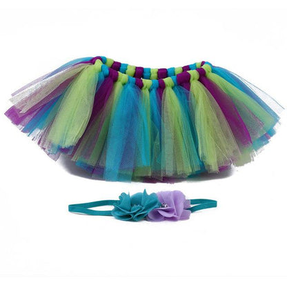 Baby girl's pink princess tutu skirt and headband, excellent for newborn photo shoots.