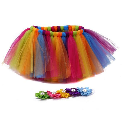Elegant pink tulle tutu skirt with a comfortable elastic waist and a stylish headband for infants.