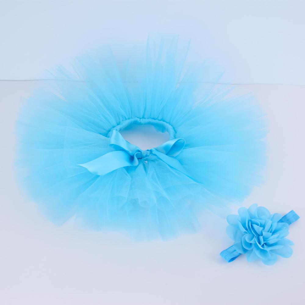 A delightful pink tulle tutu skirt and matching headband, perfect as a milestone outfit.