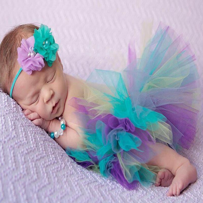 Infant pink tutu skirt and bow headband set, a lovely baby shower gift for a little princess.