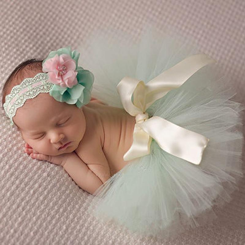 Adorable baby girl's pink tulle tutu and headband, perfect for milestone photos and special occasions.