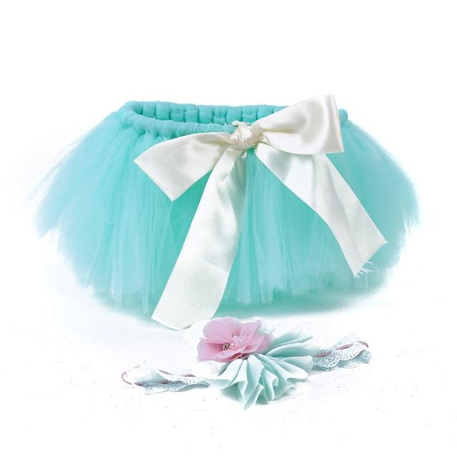 Pretty pink tulle tutu skirt and headband outfit for baby girls, suitable for any party.
