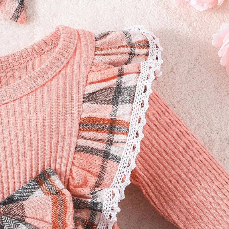 Back view of adorable baby girl's plaid princess dress with button closure, comfortable design