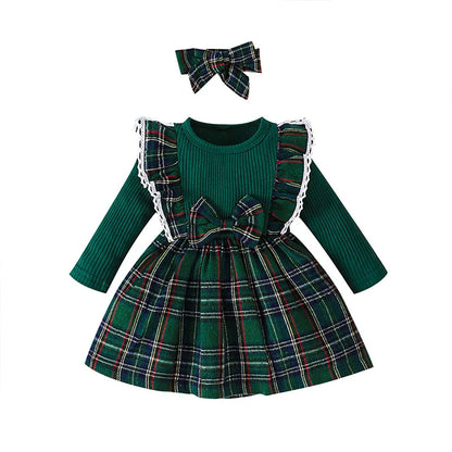 Infant girl's plaid dress, showcasing the round neckline and puff sleeves, comfortable fashion