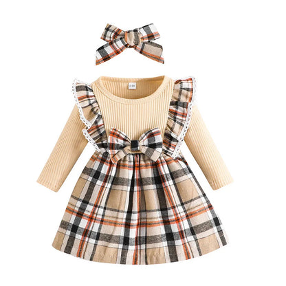 Baby girl's princess dress in classic plaid pattern, ideal for parties and special occasions