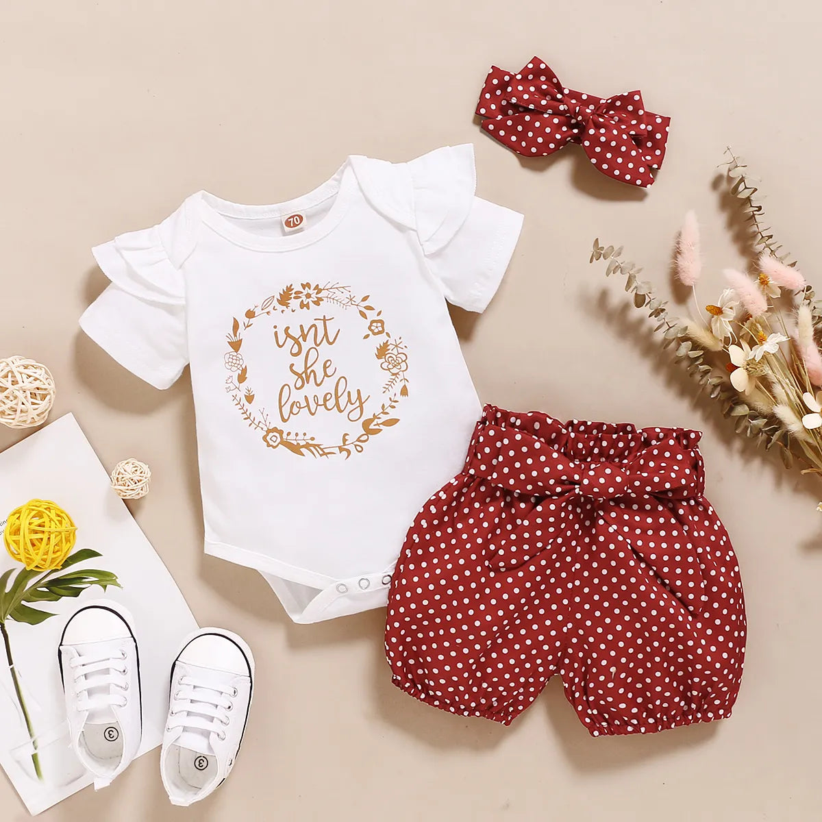 Baby girl in polka dot romper, shorts & headband set, perfect for summer casual wear