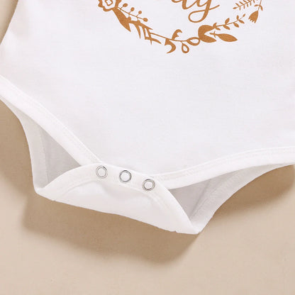 Newborn baby girl summer fashion: polka dot top, matching shorts, and cute headband