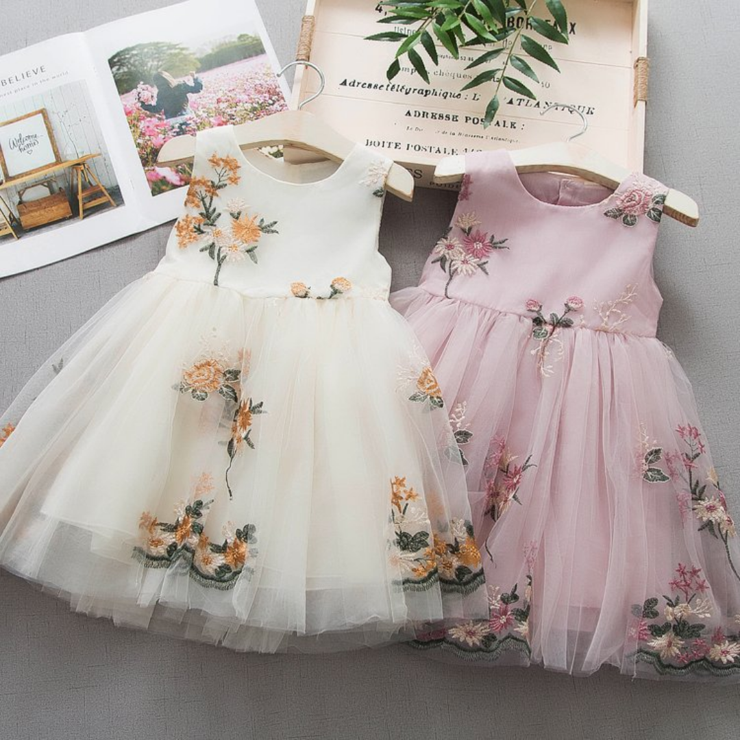 Baby girl in sleeveless floral embroidered princess dress, casual spring/summer cotton blend.