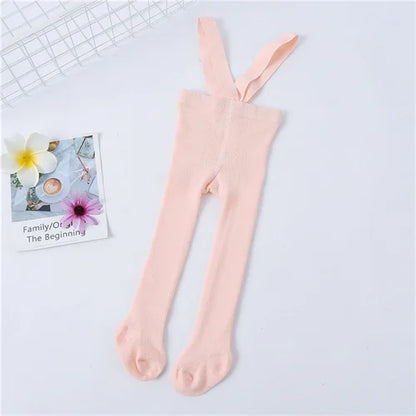 Soft pink knit tights with shoulder straps for baby girls, comfortable and stretchy newborn wear.