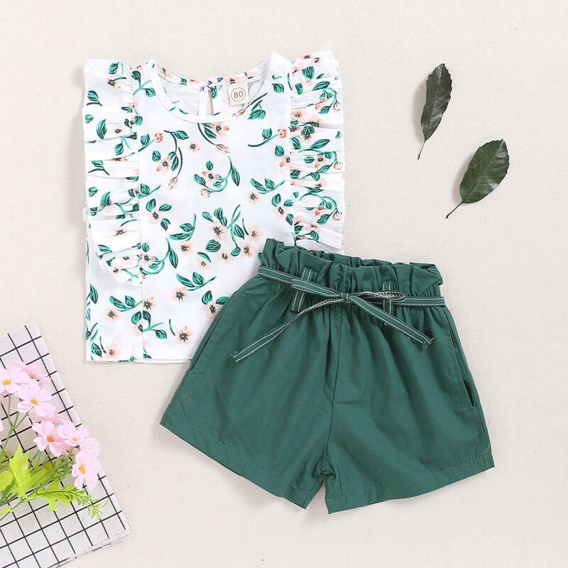 Toddler fashion: green cotton blend shorts with an elastic waistband, part of a two-piece set