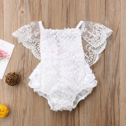 Infant girl modeling an elegant white lace princess bodysuit dress, ideal for special occasions or as a baby gift.