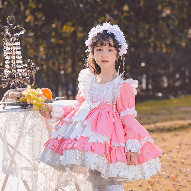 Baby girl wearing elegant long sleeve lace ruffle cotton dress, kids clothing collection