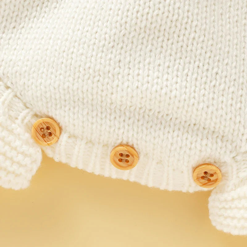 Textured pink knitted romper for baby girls, square collar, cozy and stylish