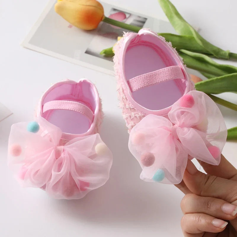 Newborn essentials: baby girl comfort shoes with soft sole and bow flower design