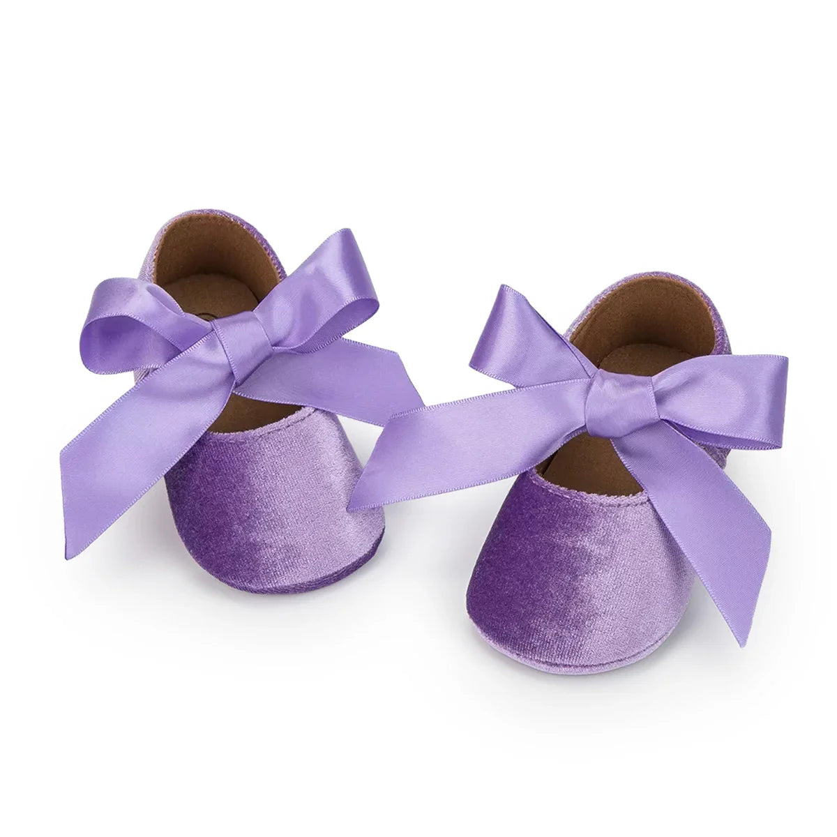 Collection of pink baby girl soft sole shoes, featuring a butterfly knot, for little feet