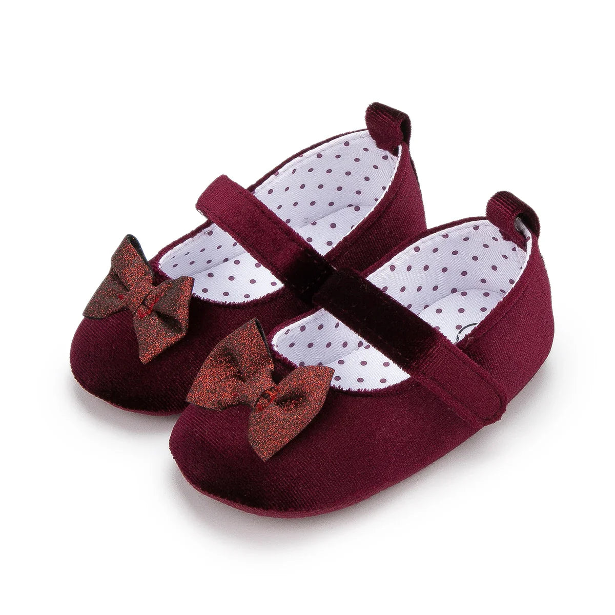 Comfortable pink infant shoes with a butterfly knot design, perfect for new walkers