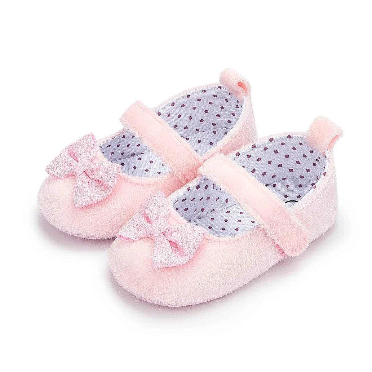 Baby girl's pink soft sole footwear, 'First Walkers' featuring a sweet butterfly-knot