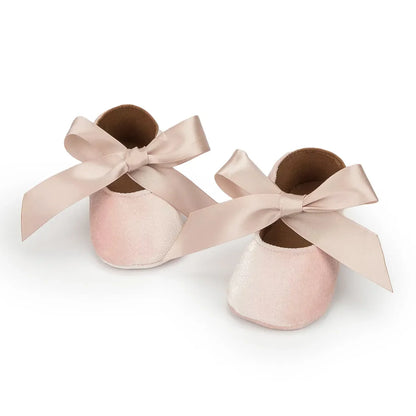 Infant girl's pink footwear, 'First Walkers' with adorable butterfly-knot embellishment