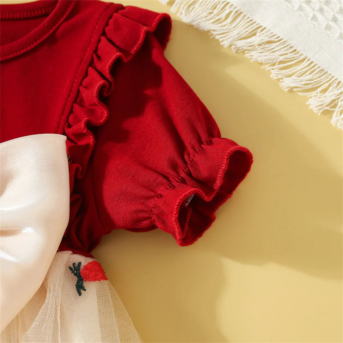 Stylish baby girl cotton mesh dress with a subtle bow detail, comfortable summer wear