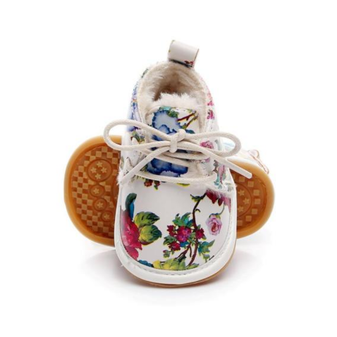 Top down view of baby girl's first walker fleece snow boots, soft and warm