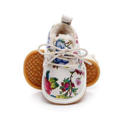 Top down view of baby girl's first walker fleece snow boots, soft and warm