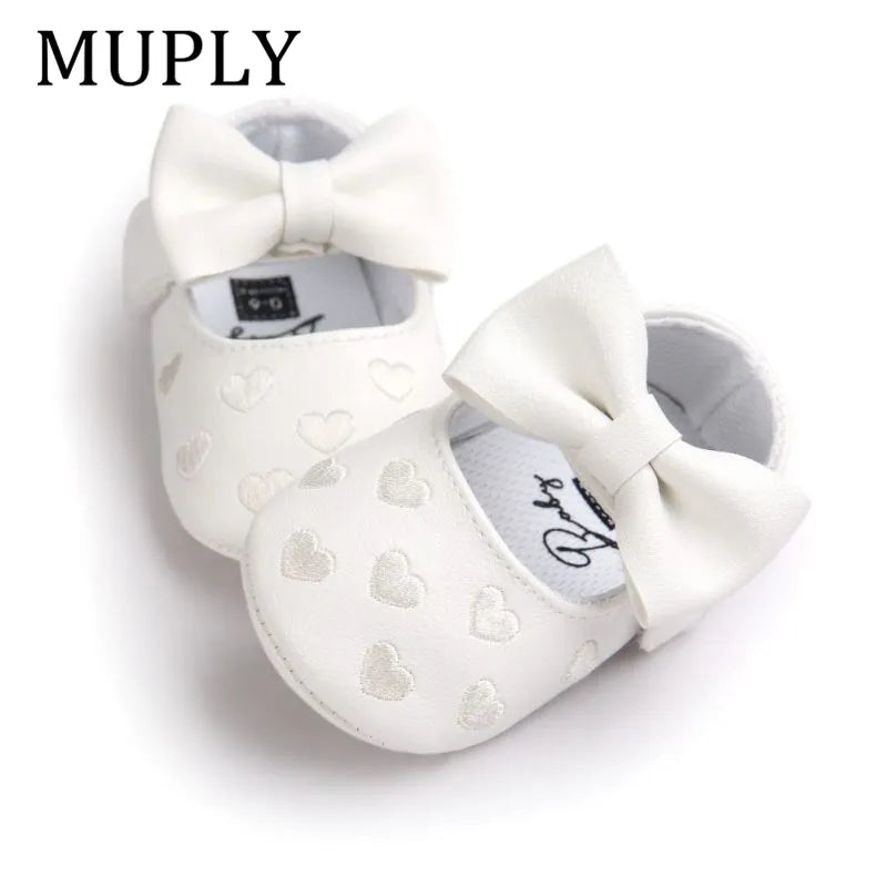 Pink baby girl slip-on moccasins, soft PU leather with heart accents, prewalker crib shoes