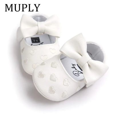 Pink baby girl slip-on moccasins, soft PU leather with heart accents, prewalker crib shoes