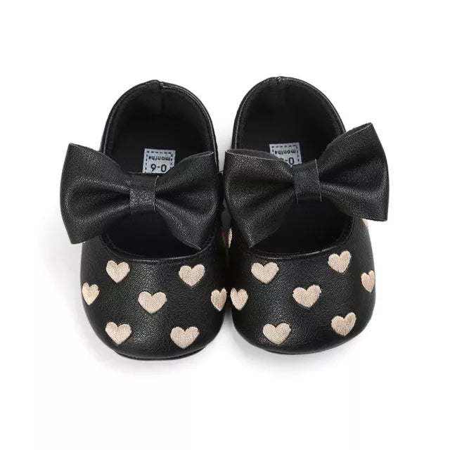 All season baby girl moccasins, pink with heart print and bow fringe, newborn crib shoes