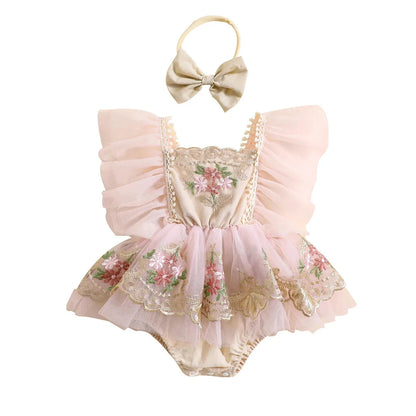 Full view of a baby girl princess romper and headband set, featuring soft fabric and floral details.