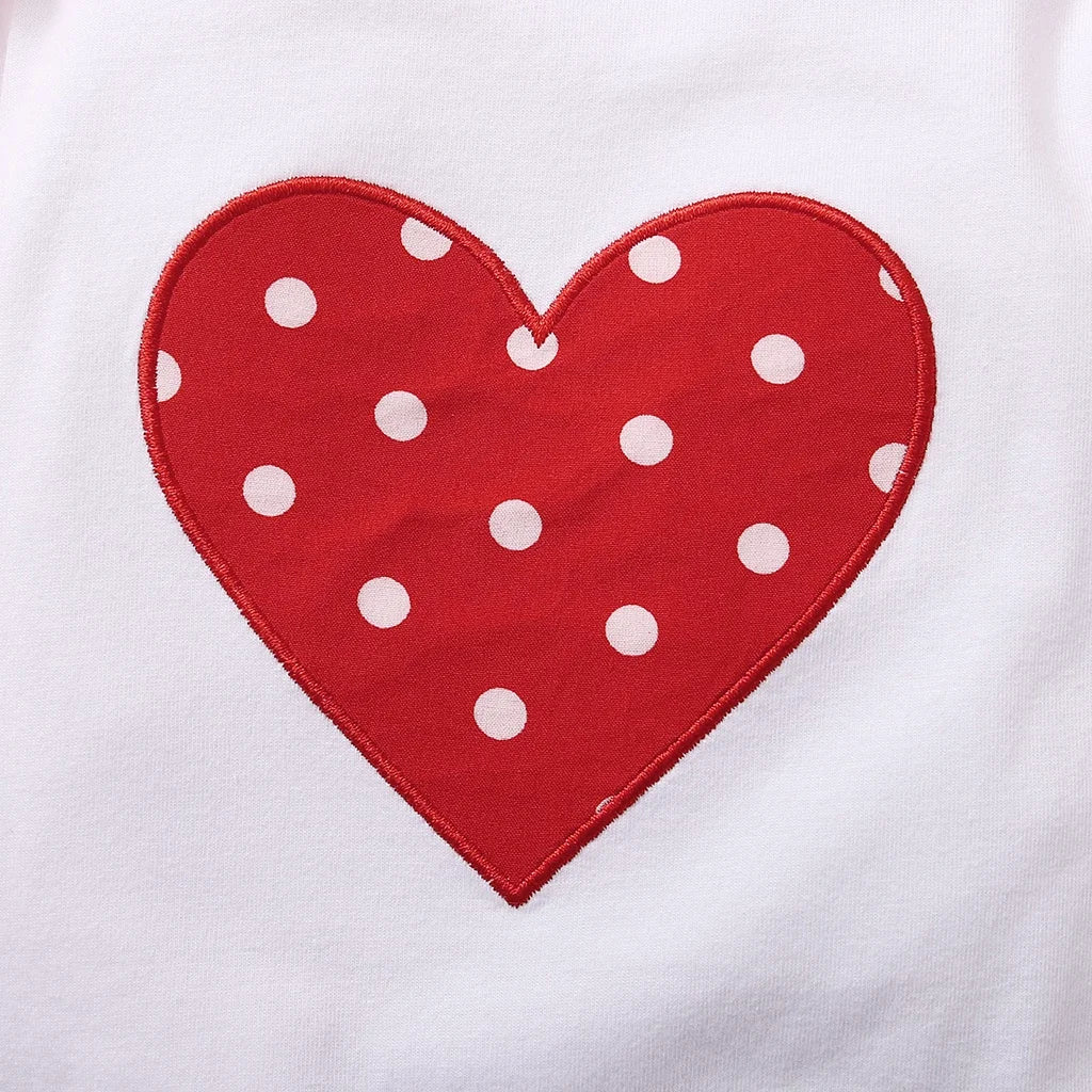 Cute baby girl's red polka dot summer bodysuit, ideal for playdates and casual wear