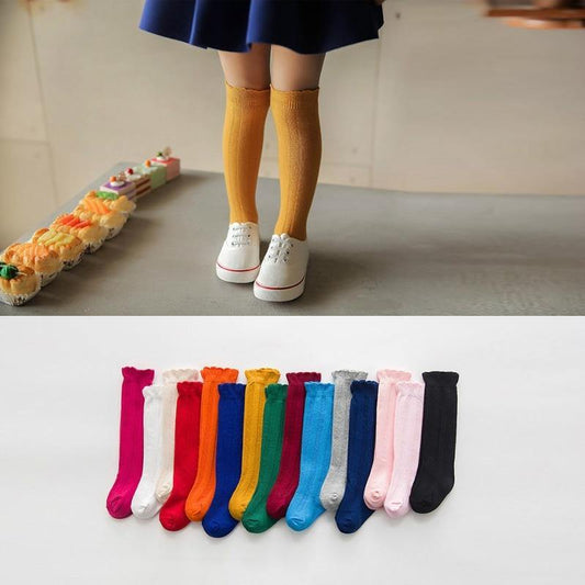 Baby girl ribbed knee-high socks, soft cotton blend for infants and toddlers.