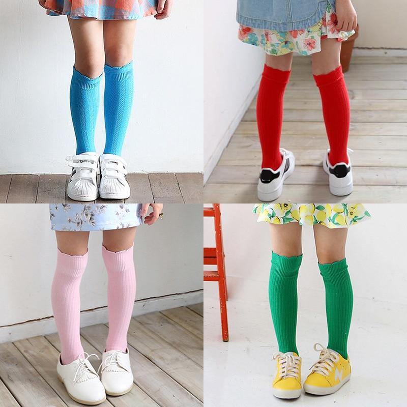 High-quality cotton ribbed knee-high socks for baby girls, durable and soft.