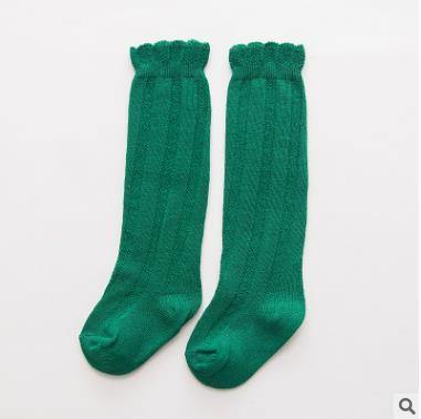 Colorful ribbed knee-high socks for baby girls, a fashionable infant accessory.