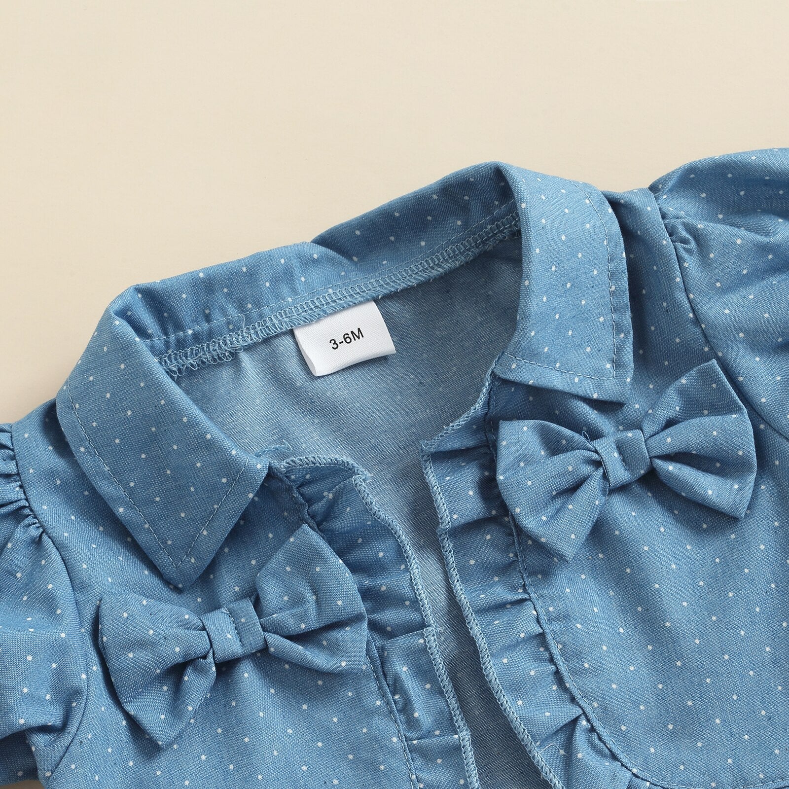 Infant girl's fashionable summer ensemble with a hearts & dots tulle dress and denim jacket