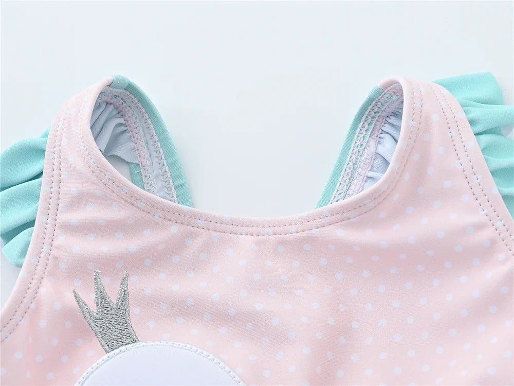 Baby girl's animal print swimwear, featuring bright colors and cute design