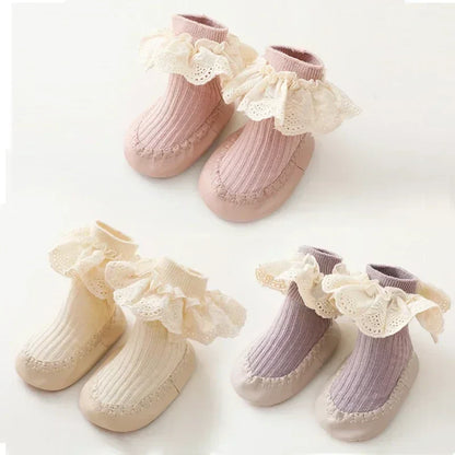 Infant girl's anti-slip first walker shoes, comfortable cotton with ruffle and bow design.