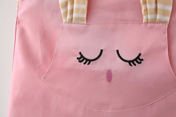 Playful infant dress, striped and featuring a cartoon cat, designed for baby girls.